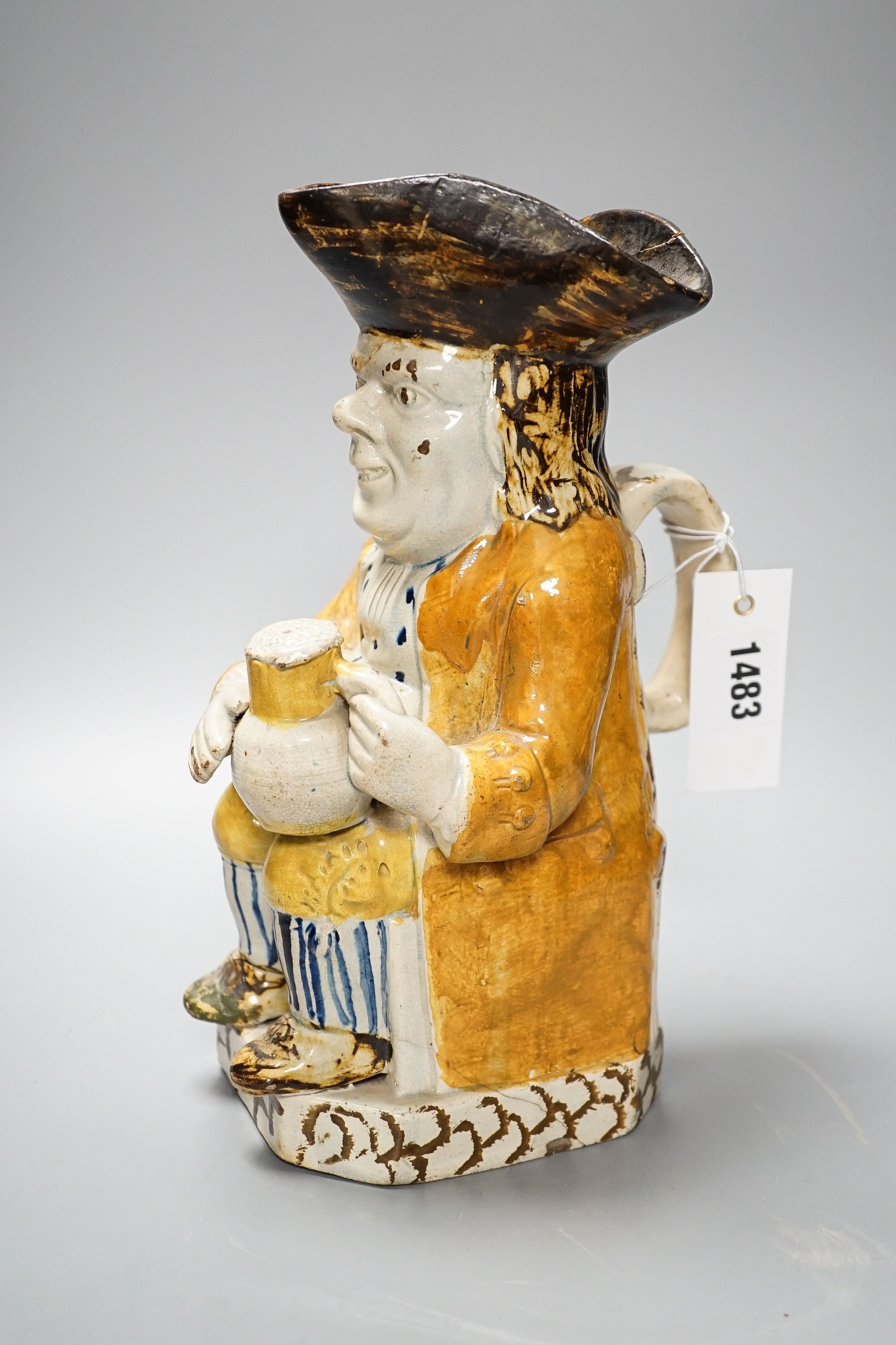 A large George III Prattware 'Good Hearty Fellow' Toby jug, c.1790-1800, height 26.5cm (restored).